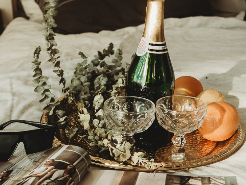 Bottle of champagne with two glasses